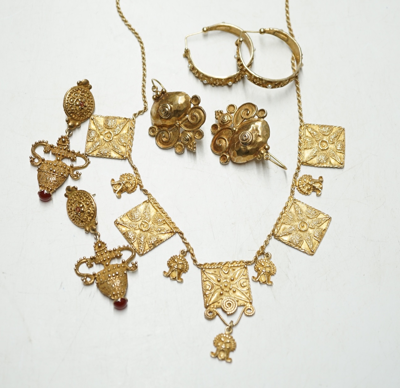 A small collection of Italian gilt 925 Etruscan revival jewellery by Louis Ciocchetti, comprising a necklace, 45.5cm and three assorted pairs of earrings. Condition - fair to good